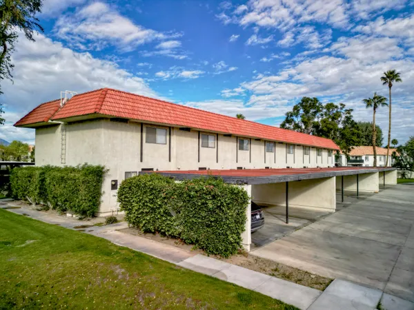 a view of a house with a yard patio and a patio