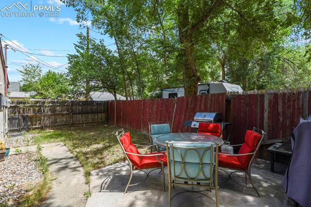 611 Alexander Road Colorado Springs, CO 80909 - Photo 22 of 24 Great patio area perfect to entertain