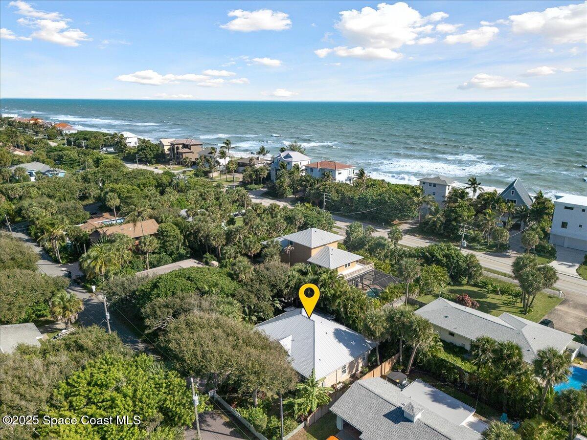 7831 Winona Road Melbourne Beach, FL 32951 - Photo 19 of 41 an aerial view of ocean and residential houses with outdoor space