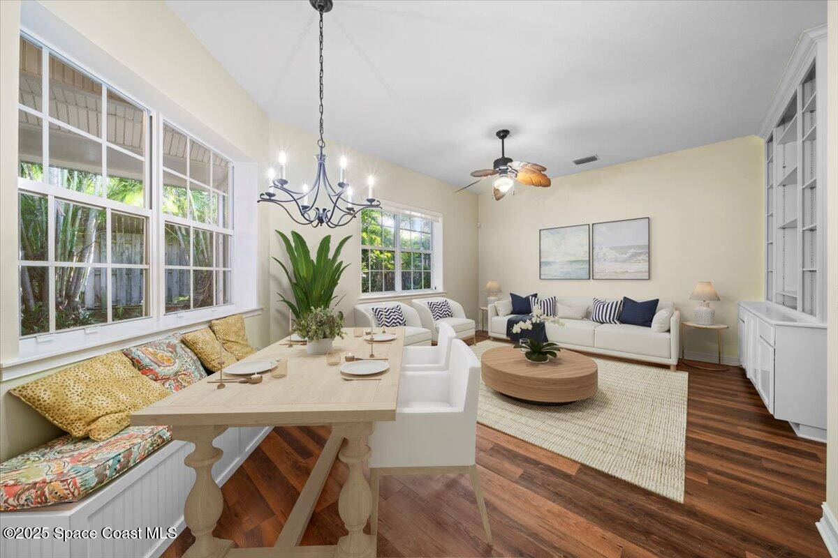 7831 Winona Road Melbourne Beach, FL 32951 - Photo 2 of 41 a view of a dining room with furniture window and wooden floor