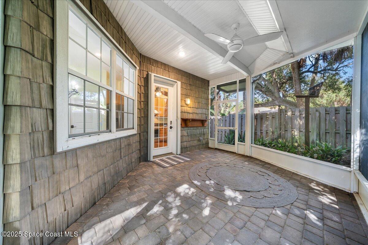 7831 Winona Road Melbourne Beach, FL 32951 - Photo 24 of 41 a view of a house with a street