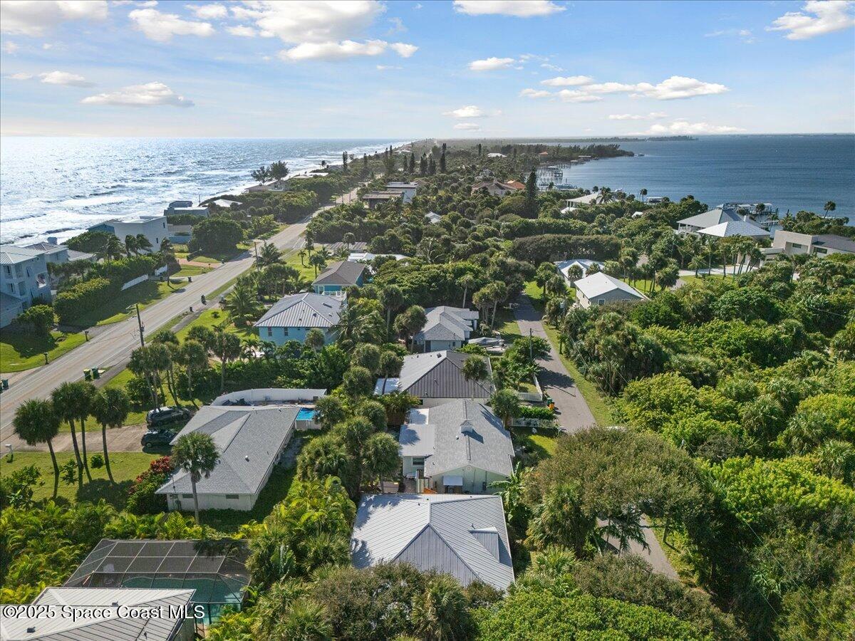 7831 Winona Road Melbourne Beach, FL 32951 - Photo 40 of 41 an aerial view of multiple house