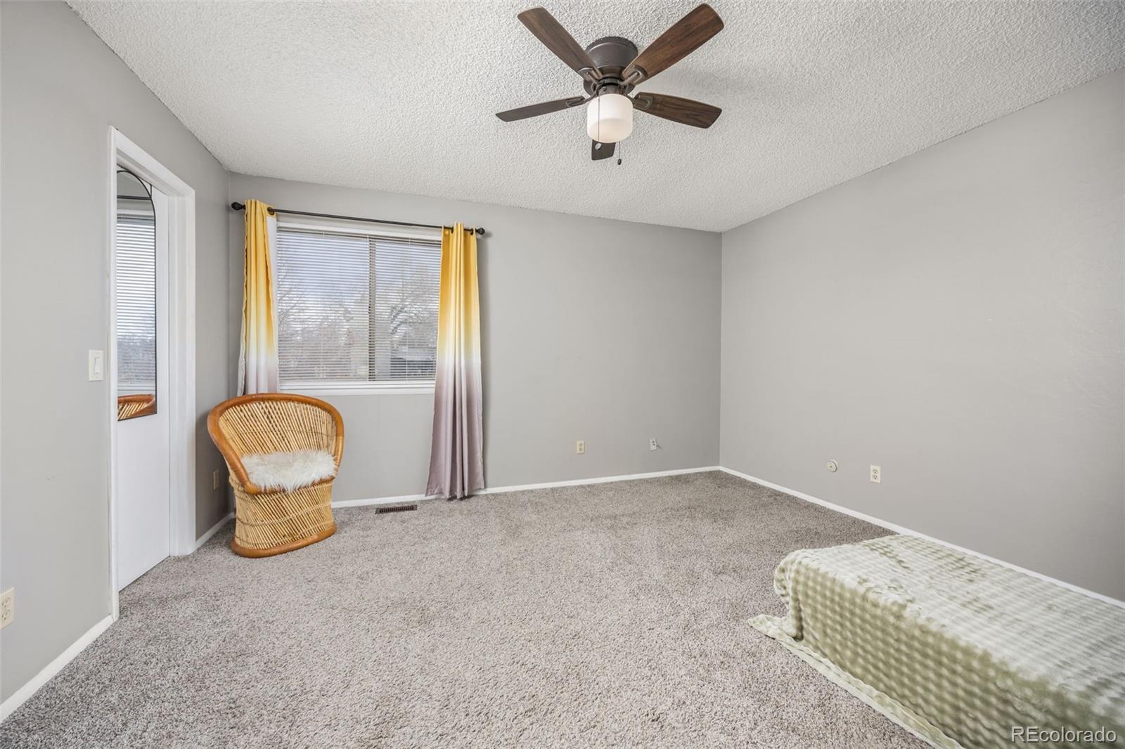 8782 Carr Loop Arvada, CO 80005 - Photo 14 of 23 a view of a livingroom with furniture