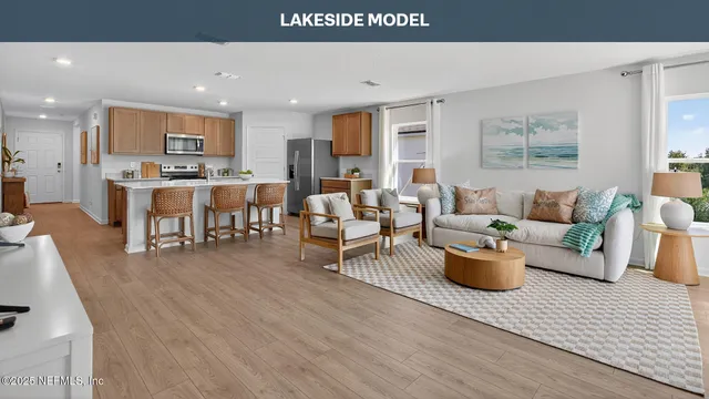 a kitchen with a table chairs refrigerator and cabinets