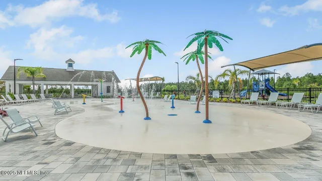 a view of a lake with a yard