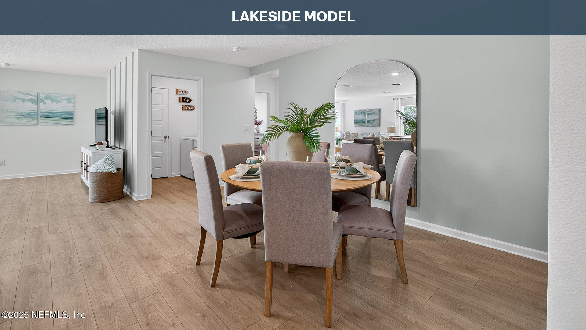 3 Oakleaf Court Palm Coast, FL 32137 - Photo 6 of 63 a view of a dining room with furniture and wooden floor