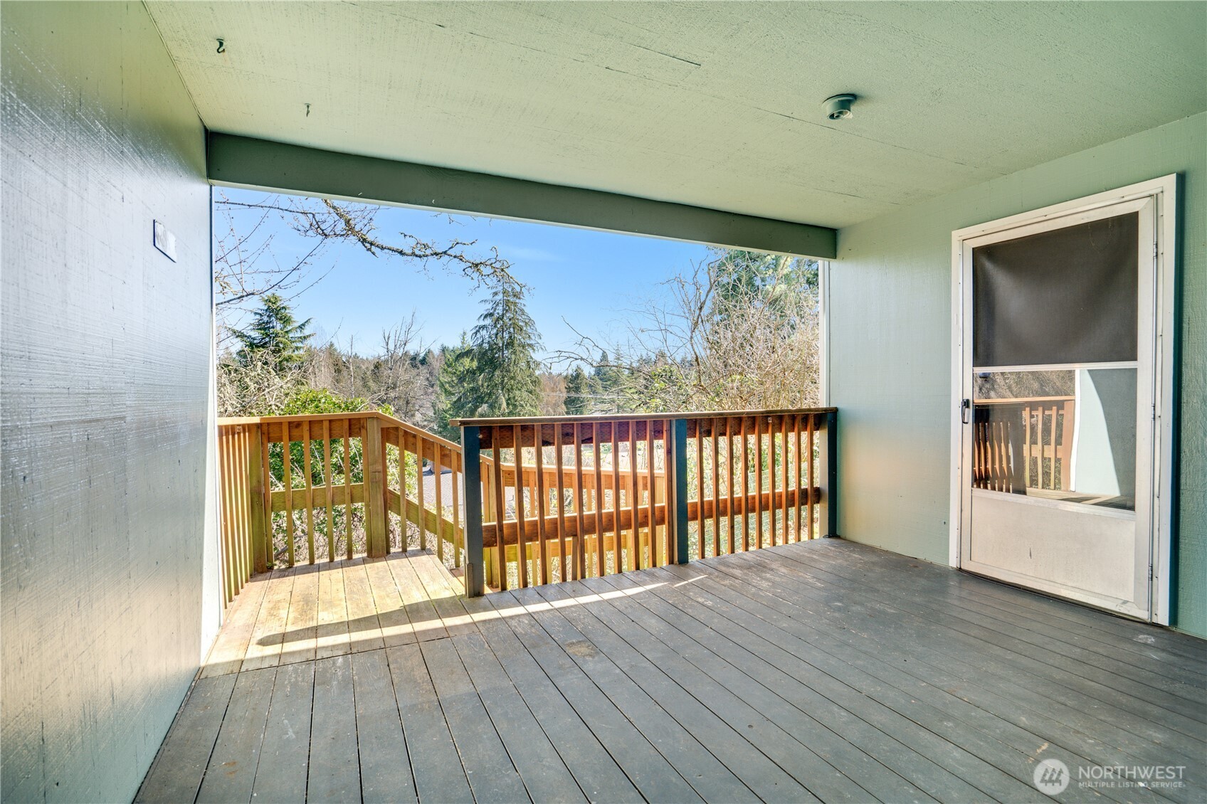 3023 Bridgeport Way West, Unit B University Place, WA 98466 - Photo 22 of 30 a view of a large window with wooden floor