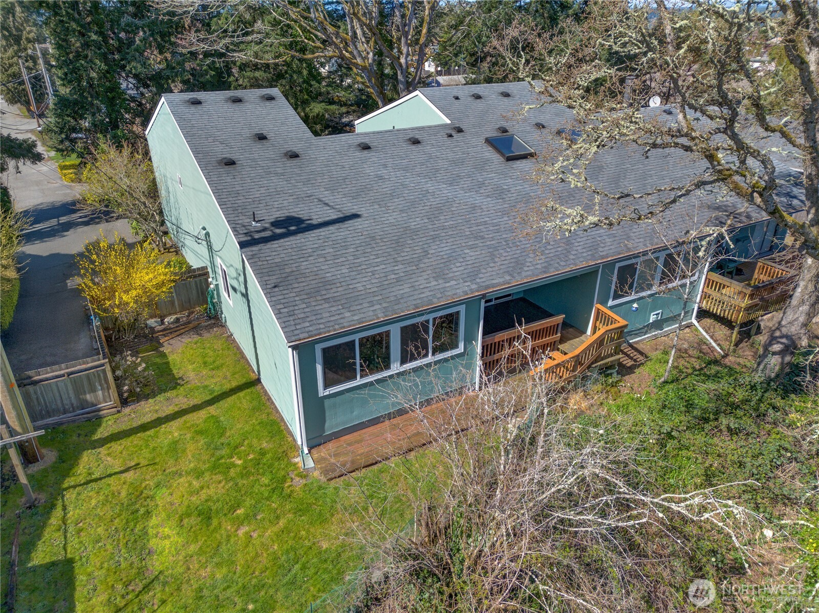 3023 Bridgeport Way West, Unit B University Place, WA 98466 - Photo 26 of 30 an aerial view of a house with a yard