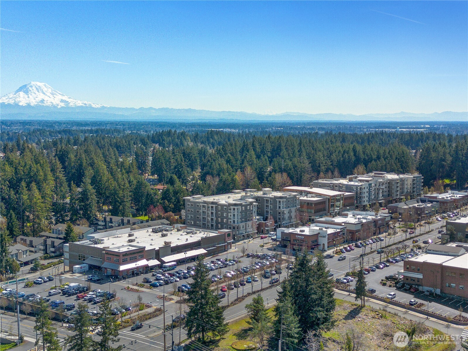 3023 Bridgeport Way West, Unit B University Place, WA 98466 - Photo 30 of 30 a view of a town with mountains in the background