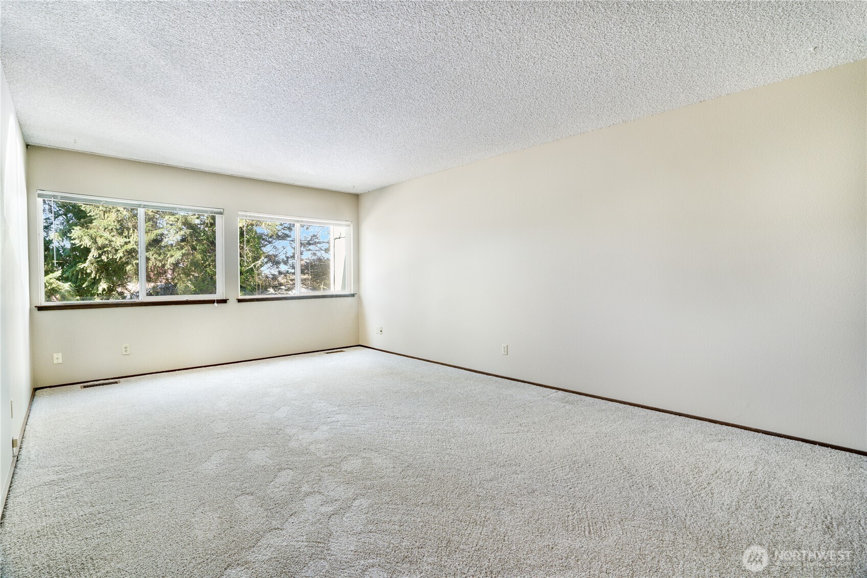 3023 Bridgeport Way West, Unit B University Place, WA 98466 - Photo 10 of 30 an empty room with windows