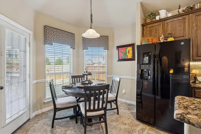 a living room with lots of furniture and a flat screen tv