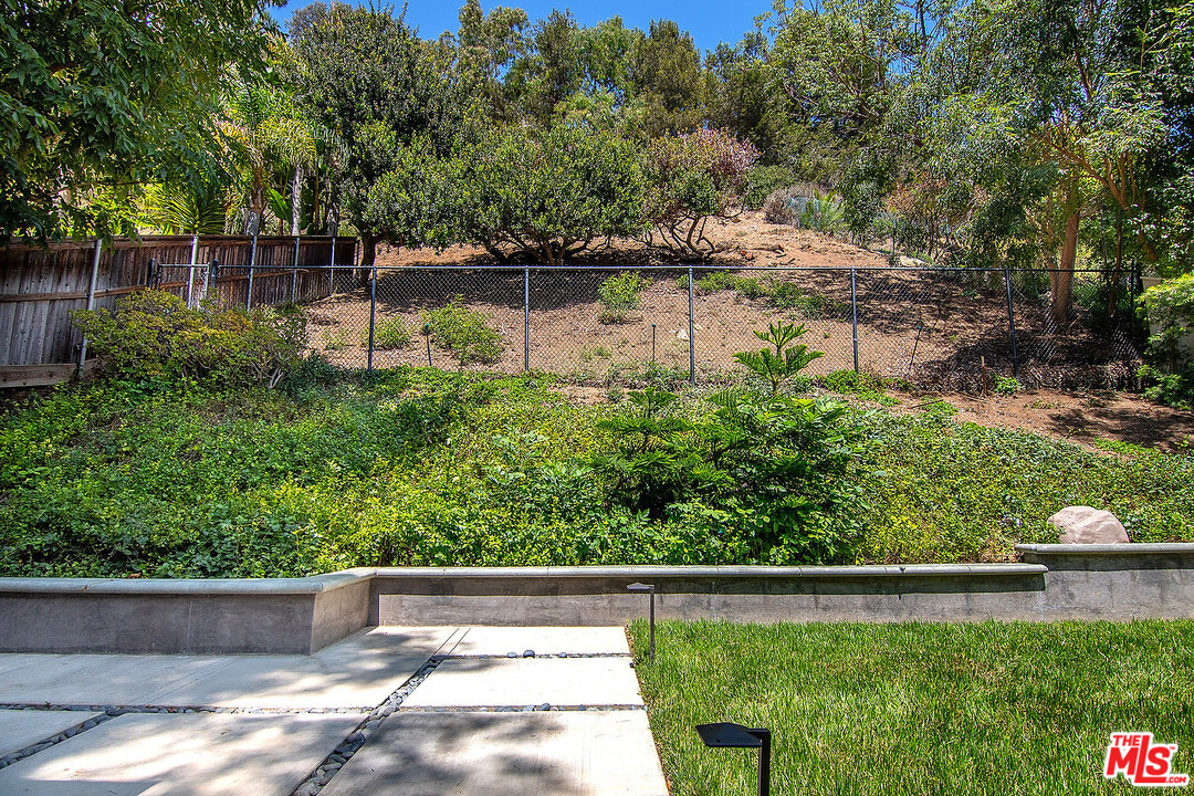 3908-a Las Flores Canyon Road Malibu, CA 90265 - Photo 32 of 60 an aerial view of a house with a yard and lake view