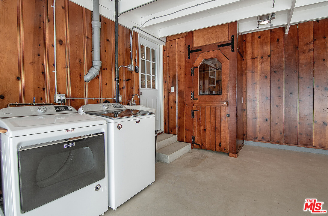 3908-a Las Flores Canyon Road Malibu, CA 90265 - Photo 36 of 60 a utility room with dryer and washer