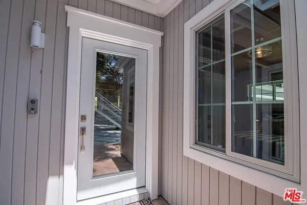 a view of a glass door with a door