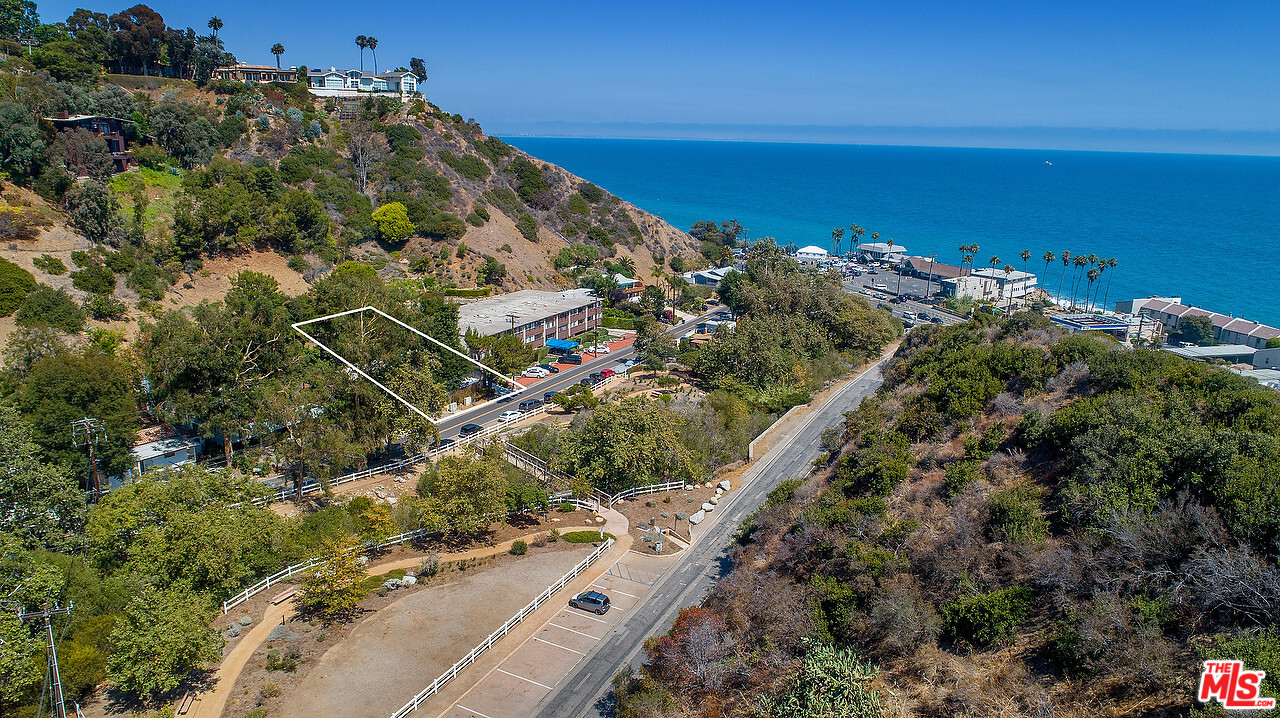 3908-a Las Flores Canyon Road Malibu, CA 90265 - Photo 57 of 60 a view of a houses with a yard