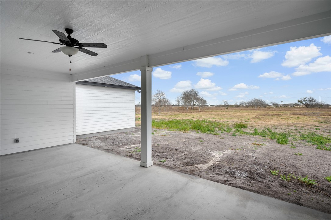 12706 County Road 1394 Sinton, TX 78387 - Photo 36 of 38 a view of a dry yard with wooden fence