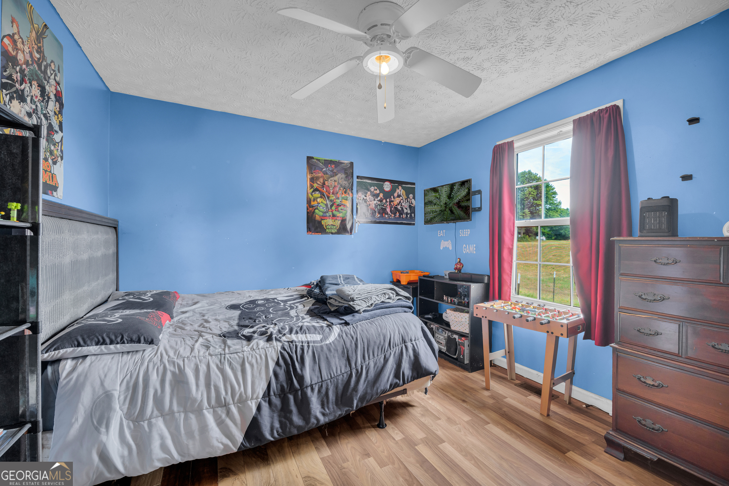 156 Shirley Road Royston, GA 30662 - Photo 18 of 29 a bedroom with a bed and a window