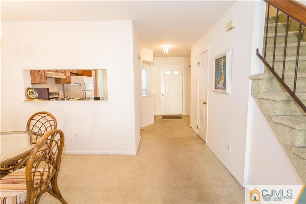 405 Maplecrest Road, Unit 405 Edison, NJ 08820 - Photo 2 of 33 a view of a hallway with entryway