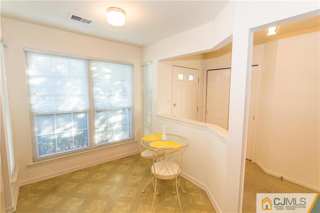 405 Maplecrest Road, Unit 405 Edison, NJ 08820 - Photo 10 of 33 a bathroom with a bathtub and a shower