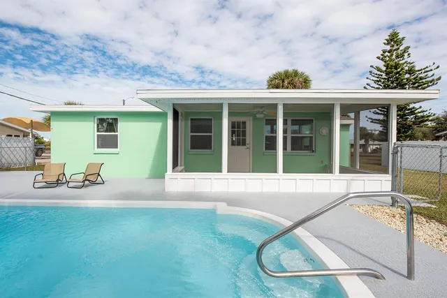 front view of house with outdoor seating