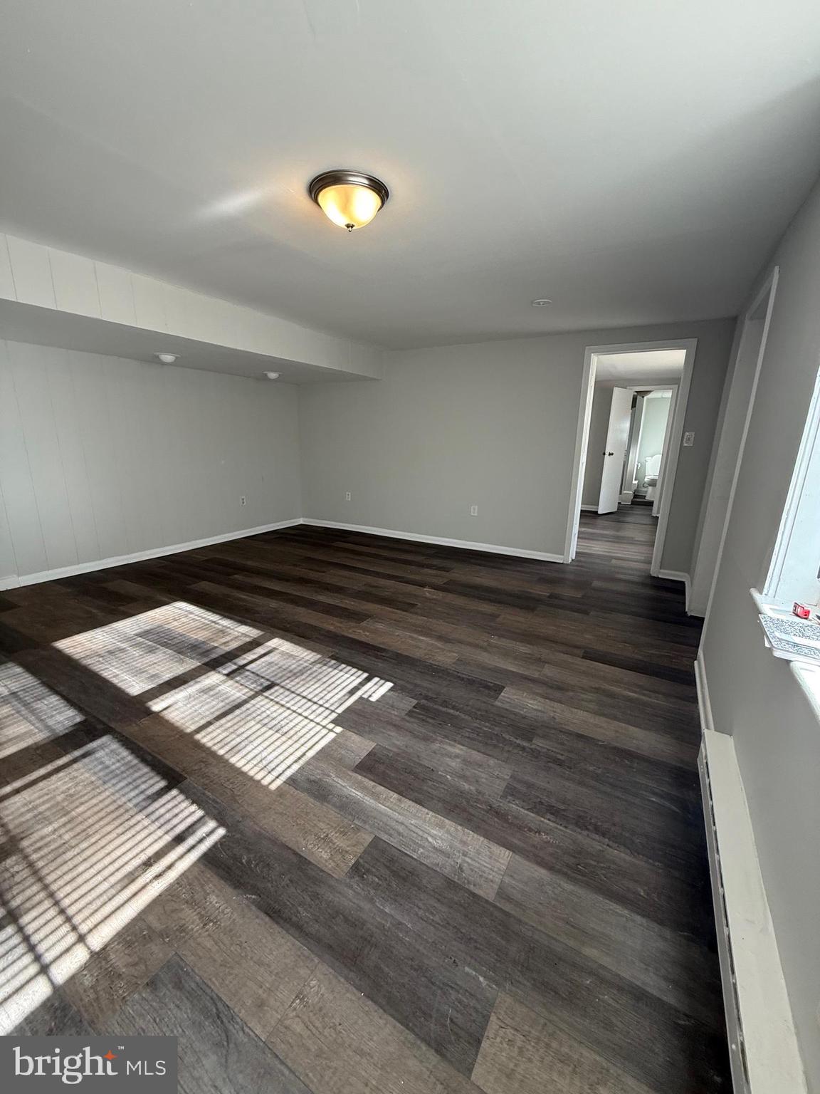 1300 South Merrimac Road Camden, NJ 08104 - Photo 19 of 25 a view of an empty room and wooden floor