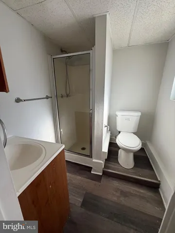 a bathroom with a toilet and a sink