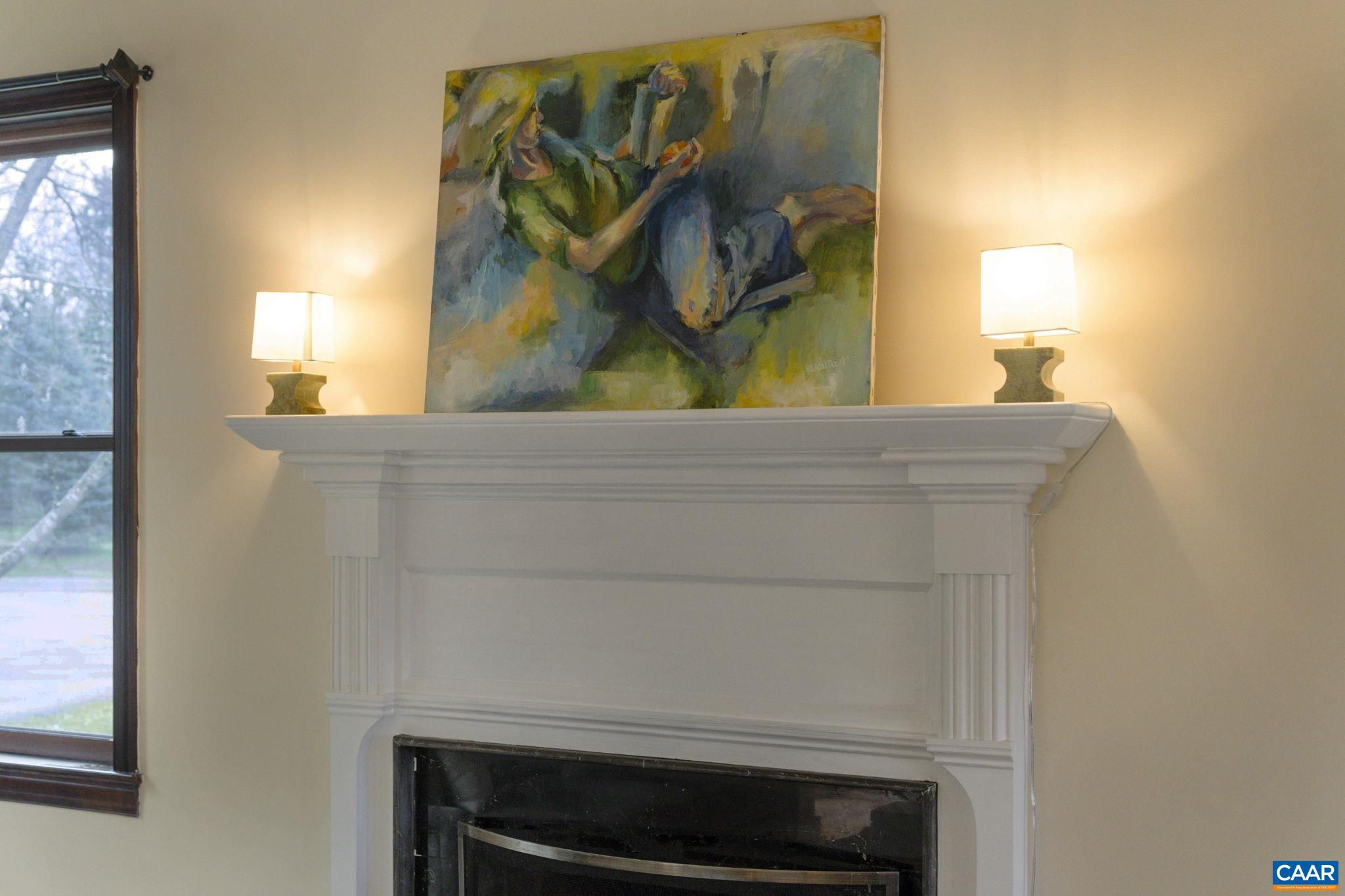 570 Rodes Drive Charlottesville, VA 22903 - Photo 12 of 75 a bathroom with a sink and a mirror