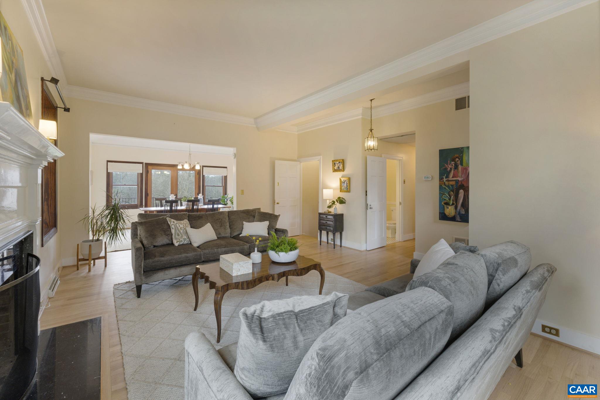 570 Rodes Drive Charlottesville, VA 22903 - Photo 13 of 75 a living room with furniture and a flat screen tv