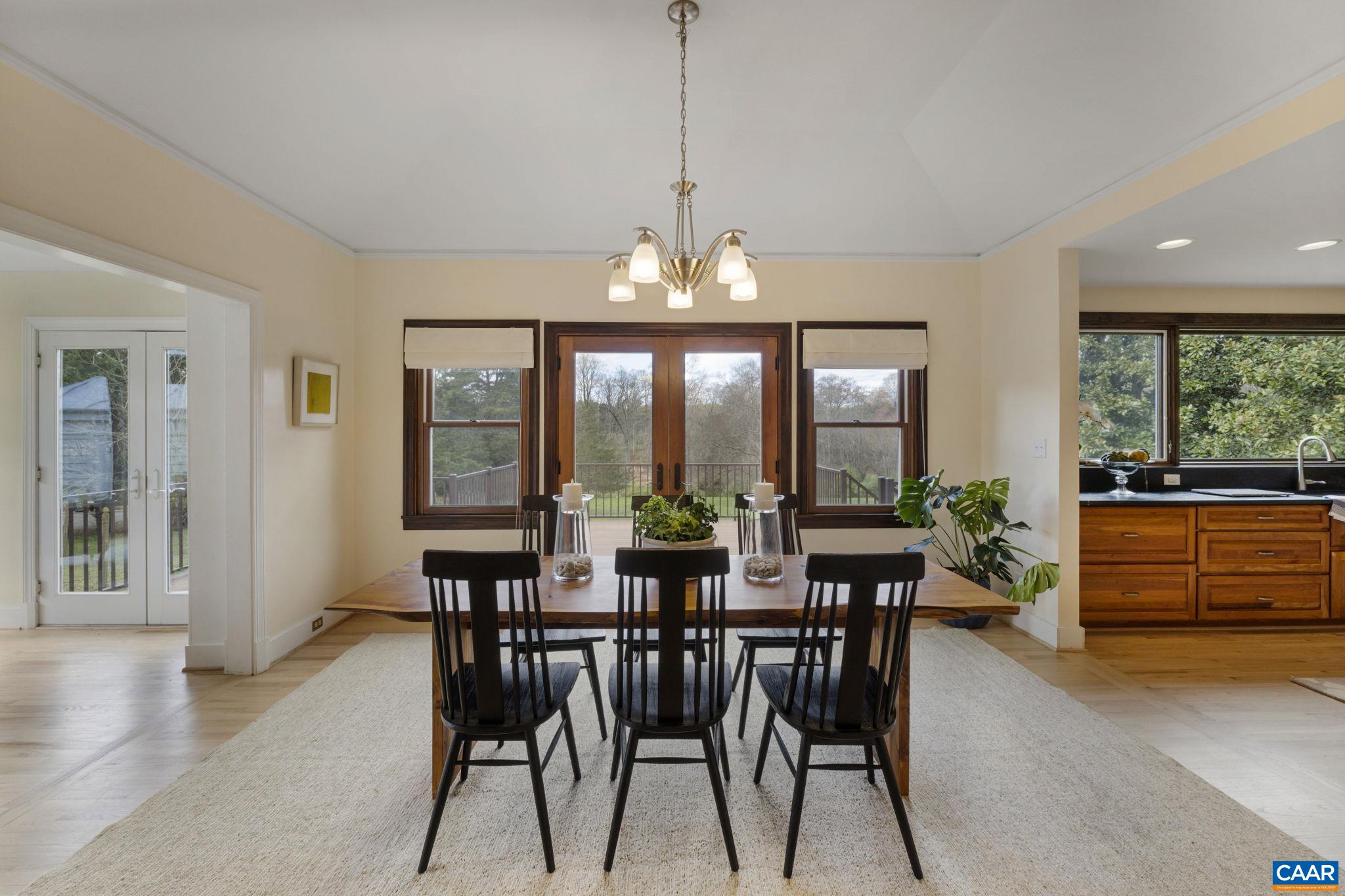 570 Rodes Drive Charlottesville, VA 22903 - Photo 15 of 75 a dining room with furniture window wooden floor