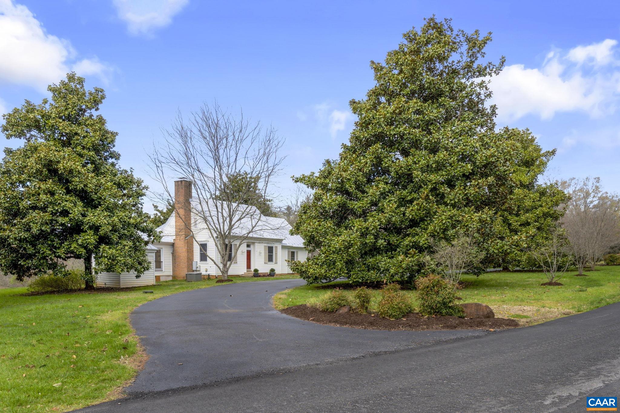 570 Rodes Drive Charlottesville, VA 22903 - Photo 3 of 75 a view of a house with a big yard plants and large trees