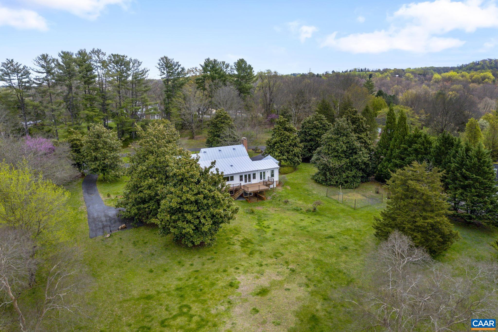 570 Rodes Drive Charlottesville, VA 22903 - Photo 46 of 75 a view of a garden with mountain