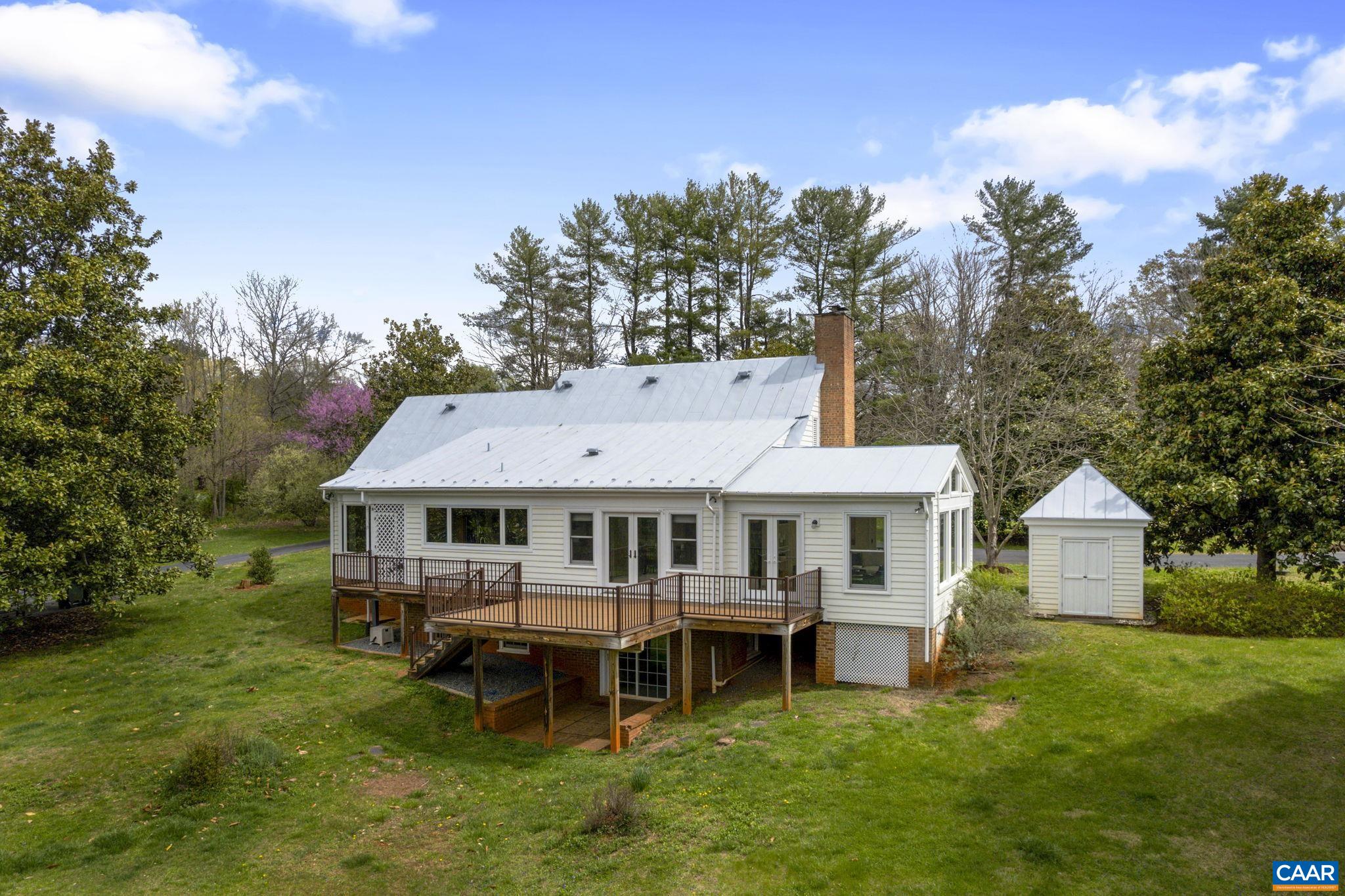 570 Rodes Drive Charlottesville, VA 22903 - Photo 47 of 75 a front view of a house with garden