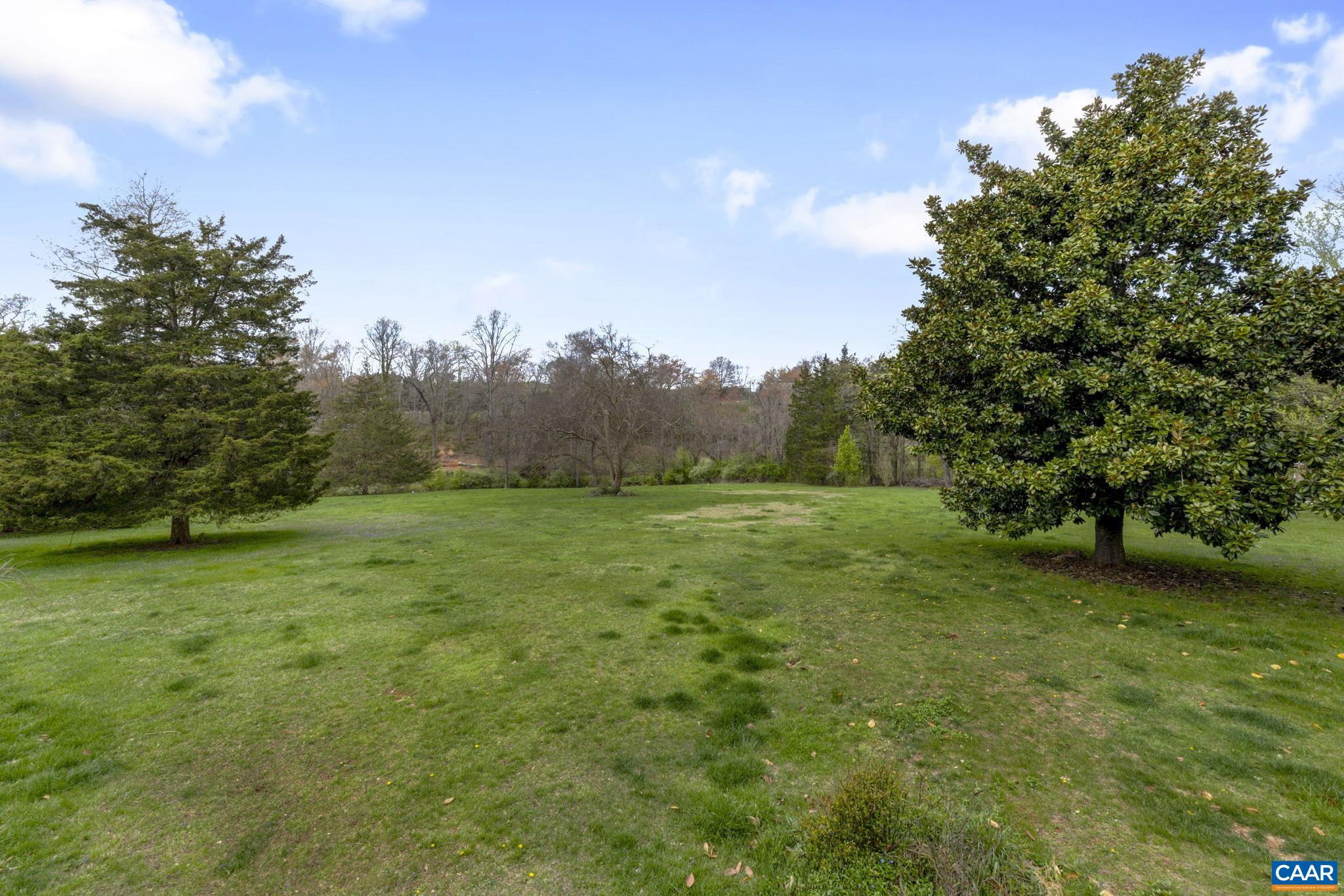 570 Rodes Drive Charlottesville, VA 22903 - Photo 54 of 75 a view of a field of grass and trees