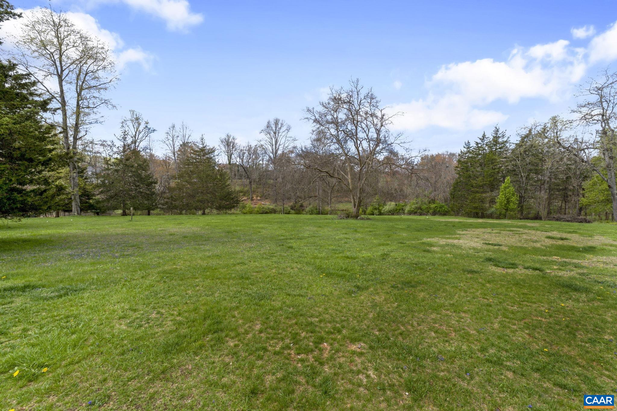 570 Rodes Drive Charlottesville, VA 22903 - Photo 55 of 75 a view of a grassy field