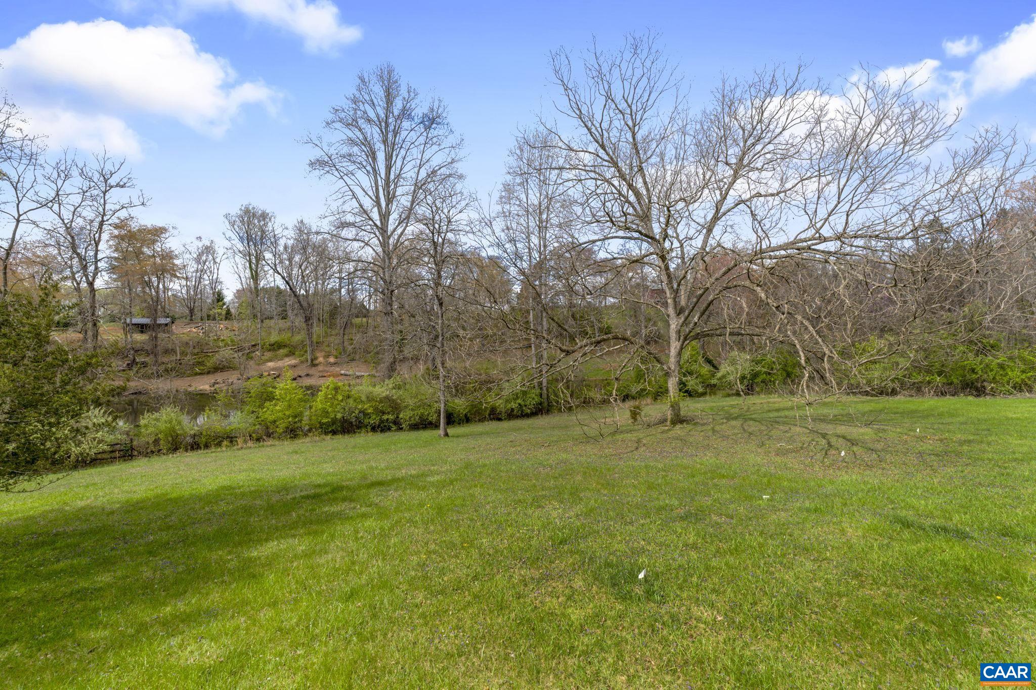 570 Rodes Drive Charlottesville, VA 22903 - Photo 56 of 75 a view of a field with trees