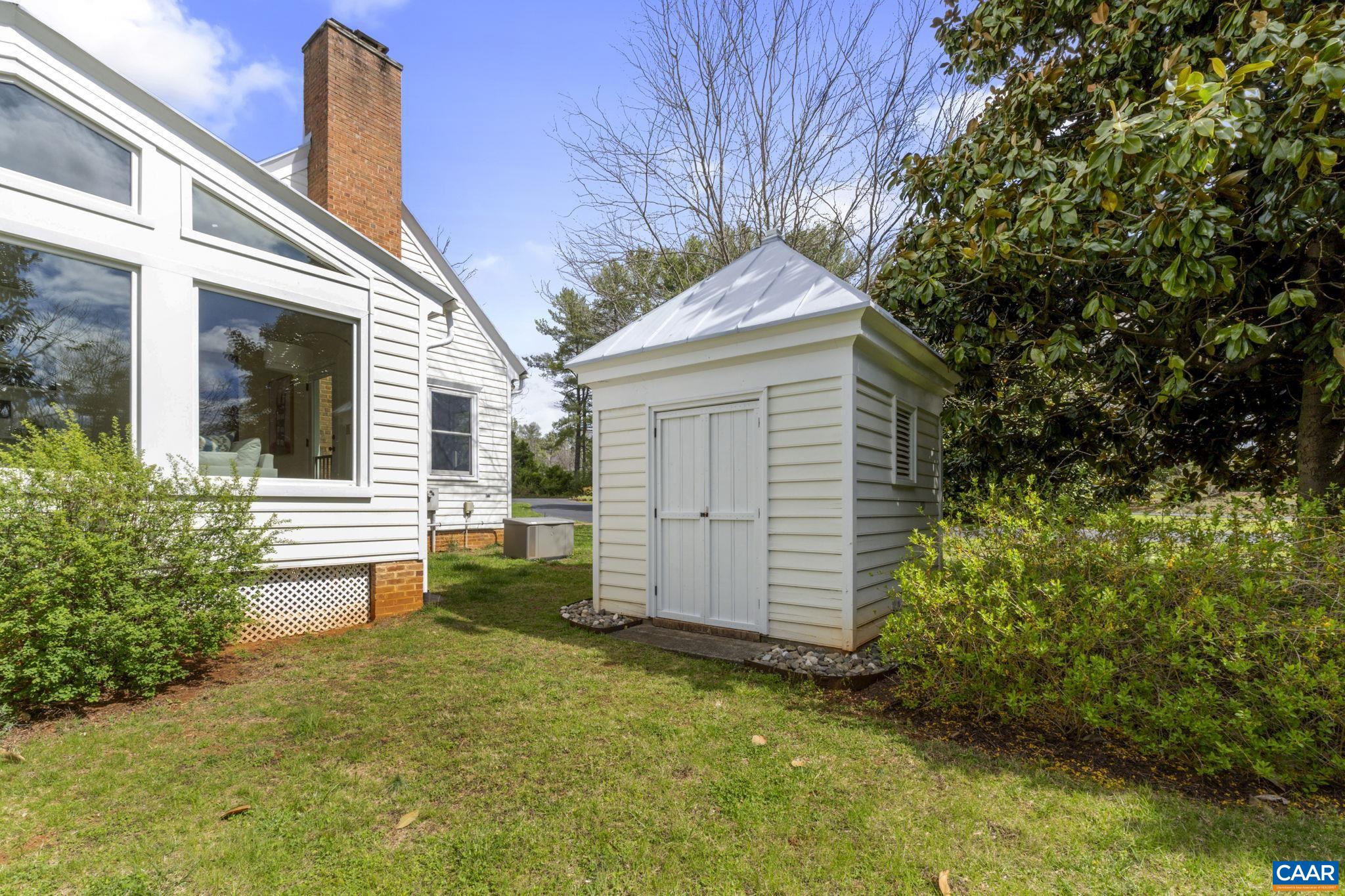 570 Rodes Drive Charlottesville, VA 22903 - Photo 59 of 75 a front view of a house with garden
