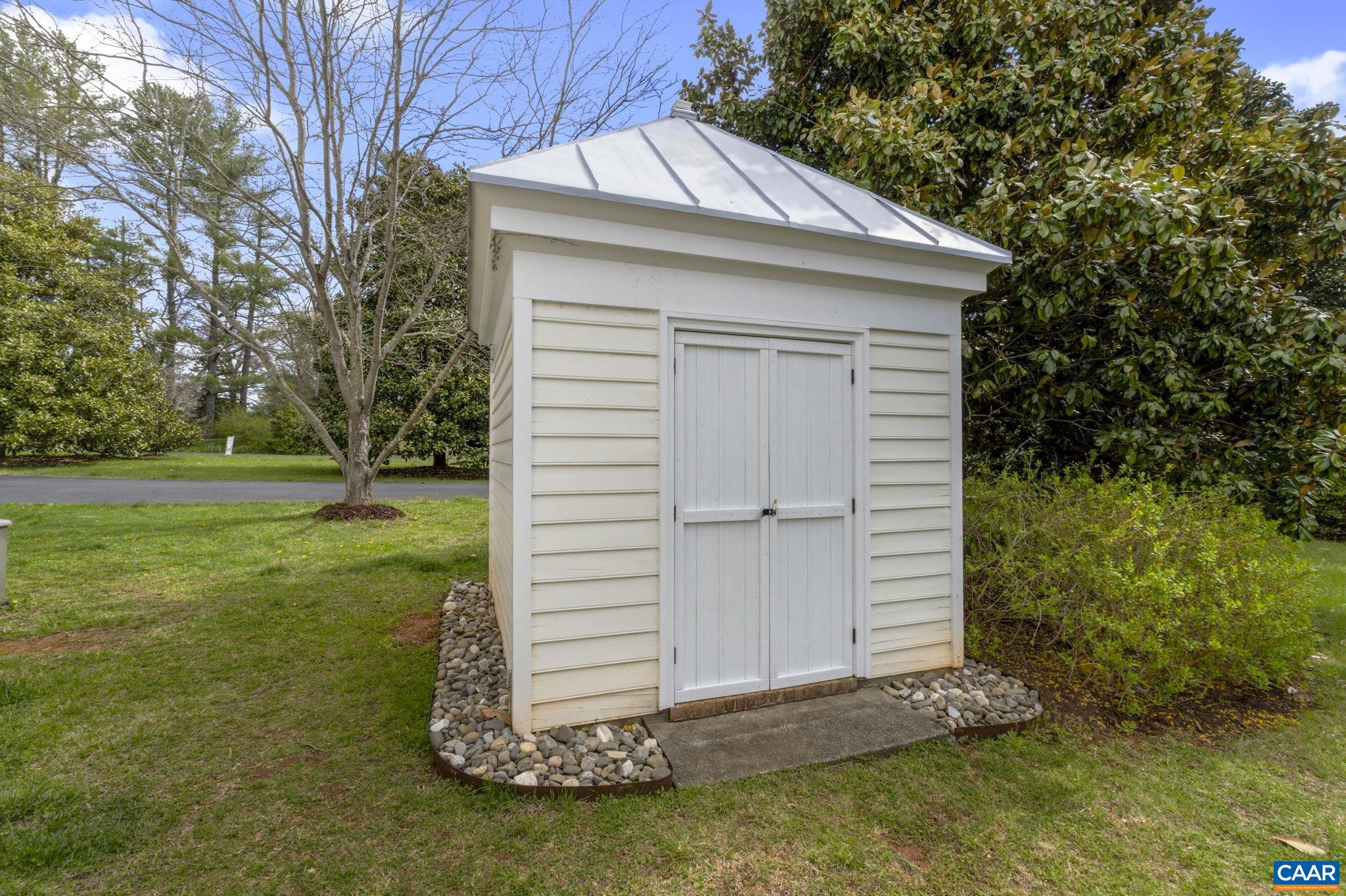 570 Rodes Drive Charlottesville, VA 22903 - Photo 60 of 75 a view of a house with a yard