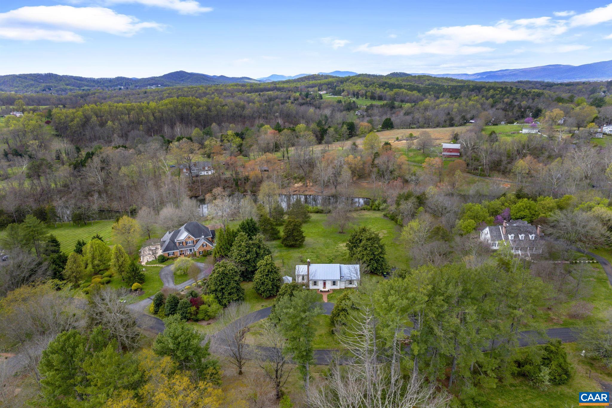 570 Rodes Drive Charlottesville, VA 22903 - Photo 62 of 75 a view of a garden with mountains in the background