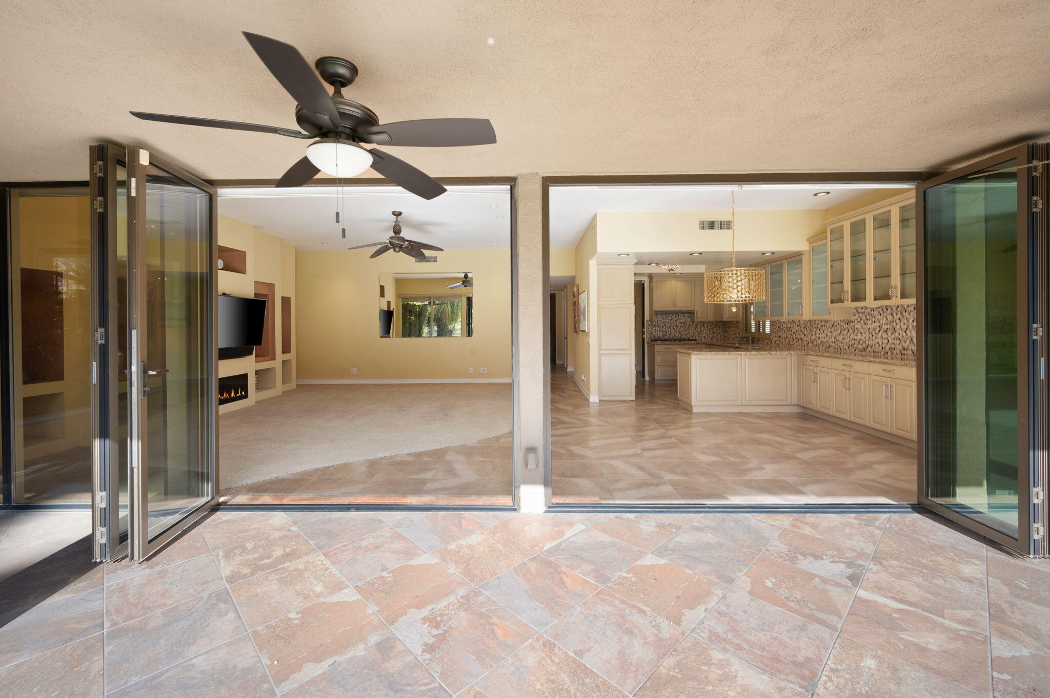 77675 Seminole Road Indian Wells, CA 92210 - Photo 14 of 40 a view of a hallway with wooden shelves
