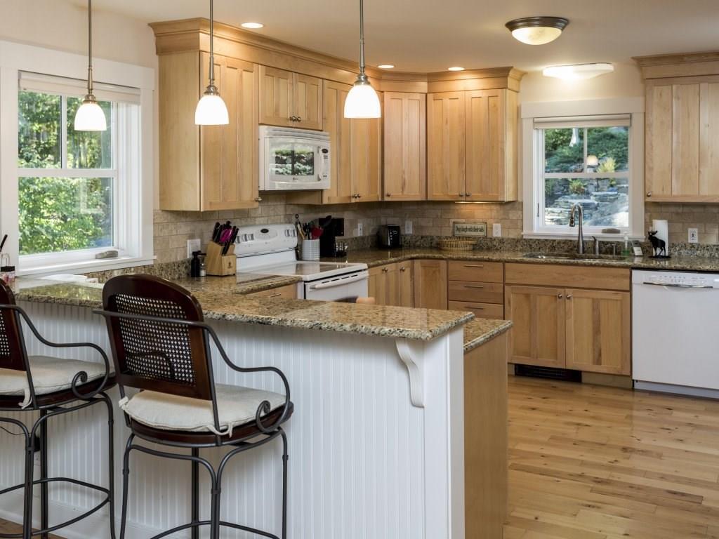 680 Ocean Point Road East Boothbay, ME 04544 - Photo 4 of 31 The kitchen with birch cabinets...