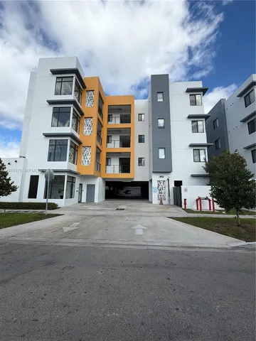 a view of large building with a street