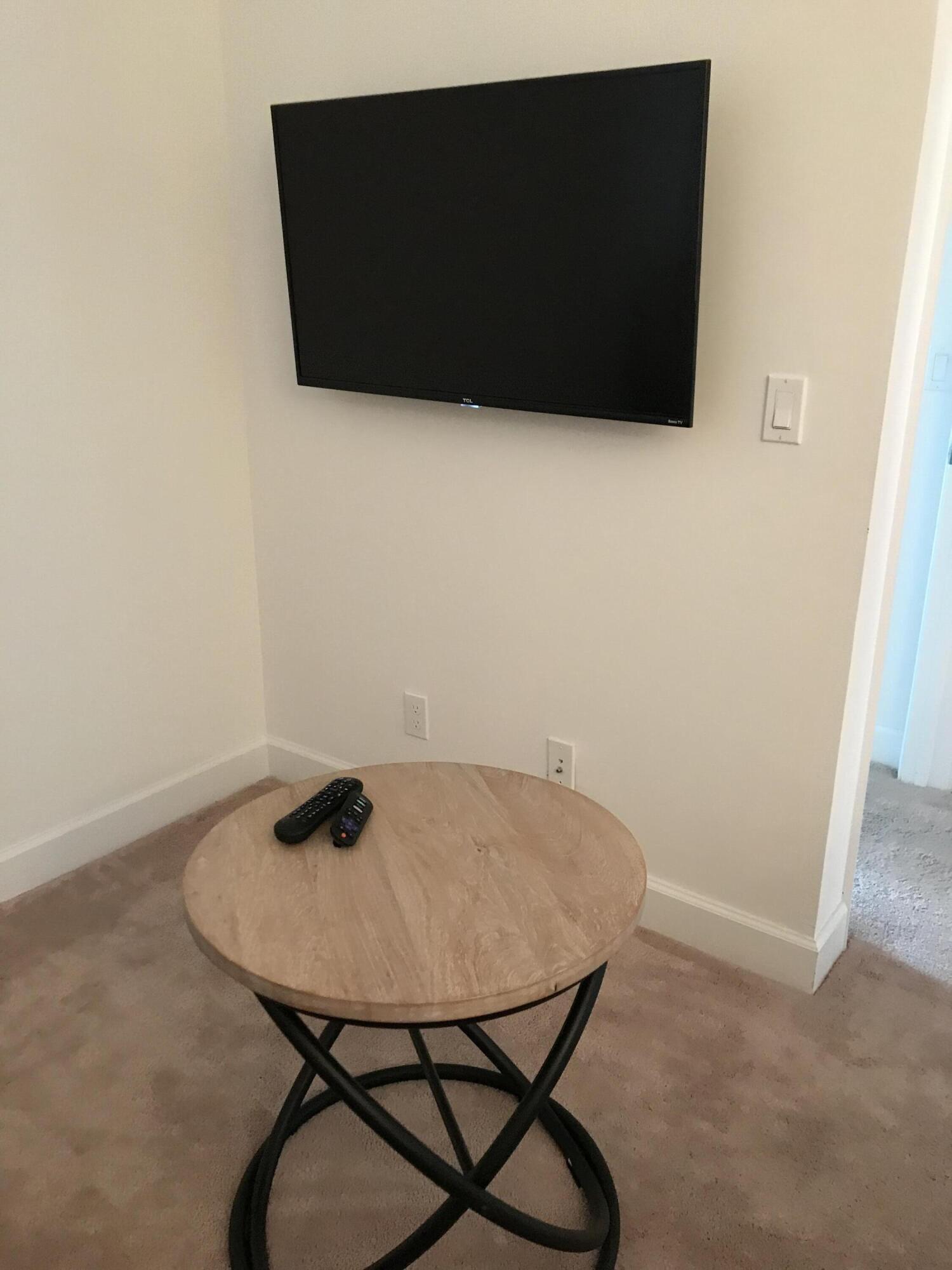 23045 Clear Echo Drive, Unit 76 Boca Raton, FL 33433 - Photo 34 of 35 a view of a furniture in wooden floor