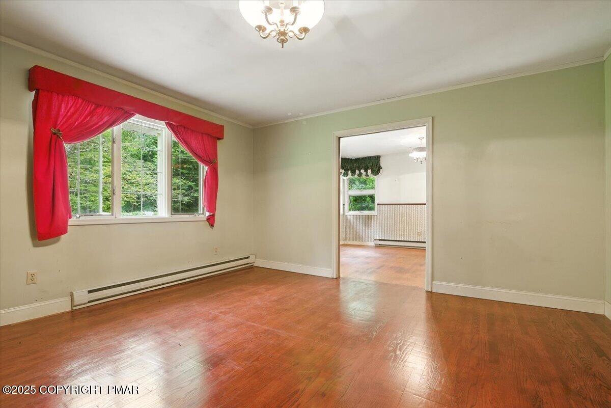142 Pine Grove Road Kunkletown, PA 18058 - Photo 18 of 78 a view of empty room with wooden floor and fan
