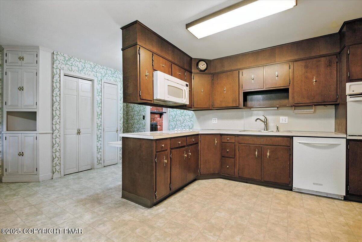 142 Pine Grove Road Kunkletown, PA 18058 - Photo 21 of 78 a kitchen with stainless steel appliances granite countertop a sink stove and refrigerator