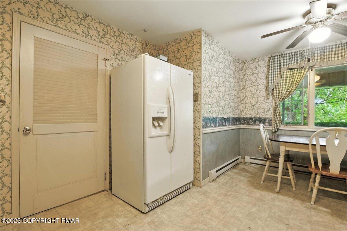 142 Pine Grove Road Kunkletown, PA 18058 - Photo 26 of 78 a kitchen with a refrigerator a sink and cabinets