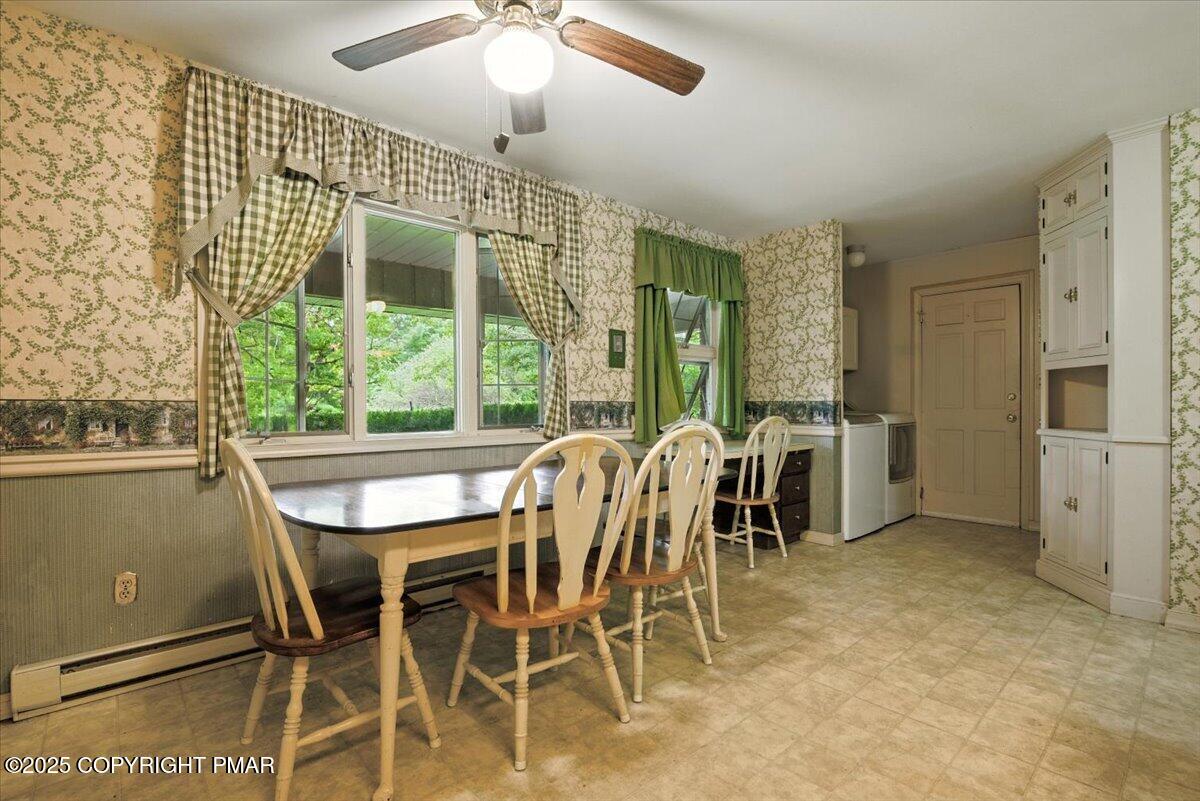 142 Pine Grove Road Kunkletown, PA 18058 - Photo 28 of 78 a dining room with furniture a chandelier and window