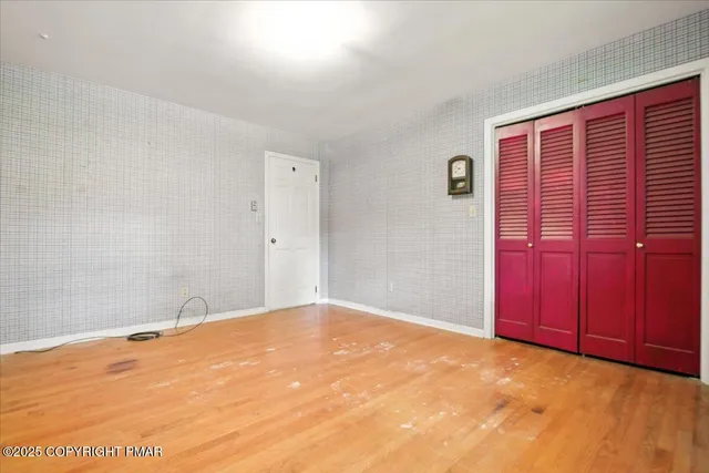 a bathroom with a sink toilet and mirror