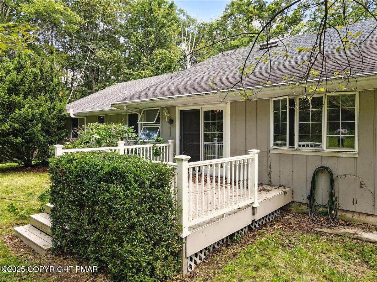 142 Pine Grove Road Kunkletown, PA 18058 - Photo 65 of 78 a view of a house with backyard and porch