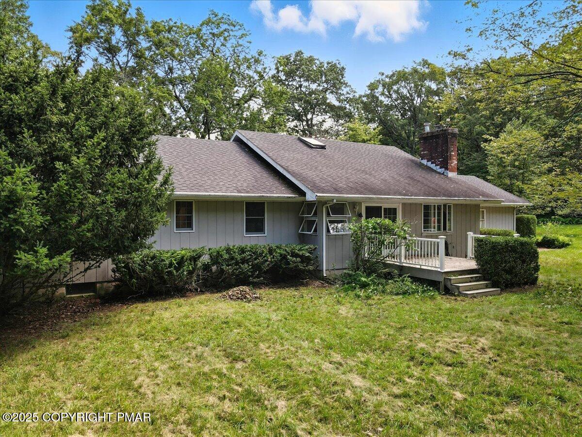 142 Pine Grove Road Kunkletown, PA 18058 - Photo 67 of 78 a front view of a house with garden