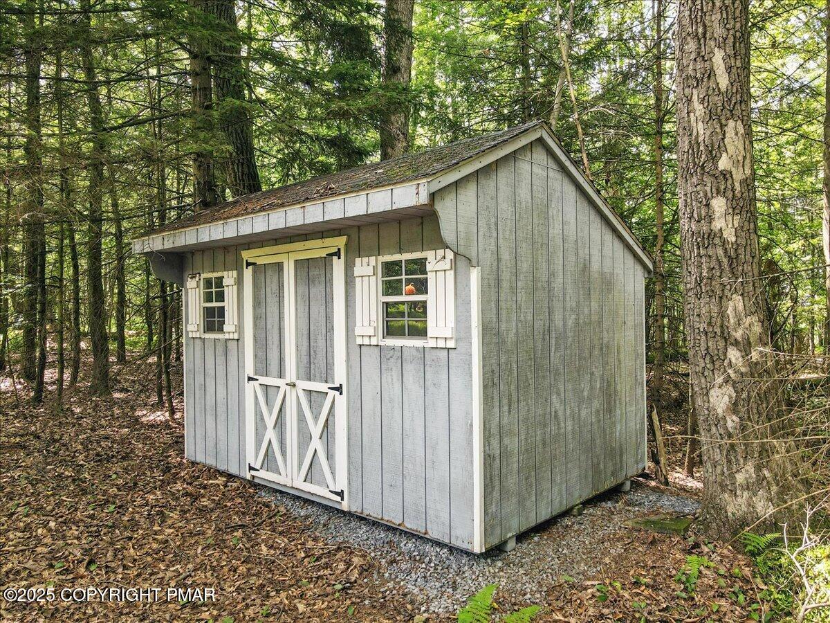 142 Pine Grove Road Kunkletown, PA 18058 - Photo 70 of 78 a view of front of house with a small yard